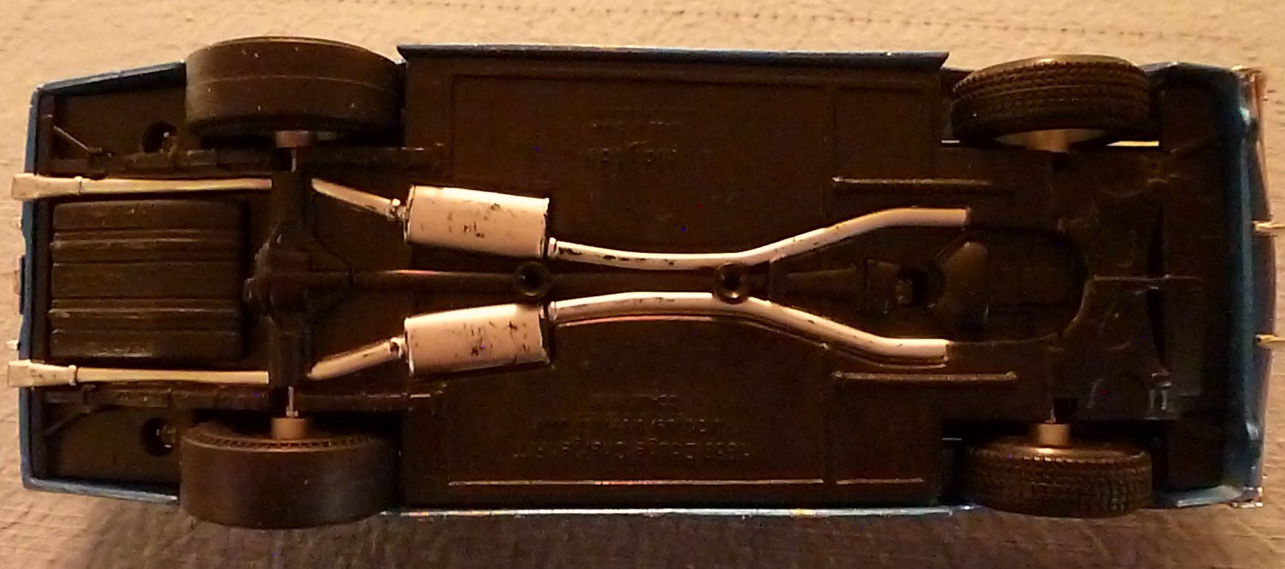 Close-up of metal pipes or exhaust components in a case.