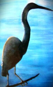 Silhouette of a bird against a blue background.