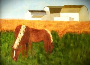 A horse grazing in a field with buildings in the background.